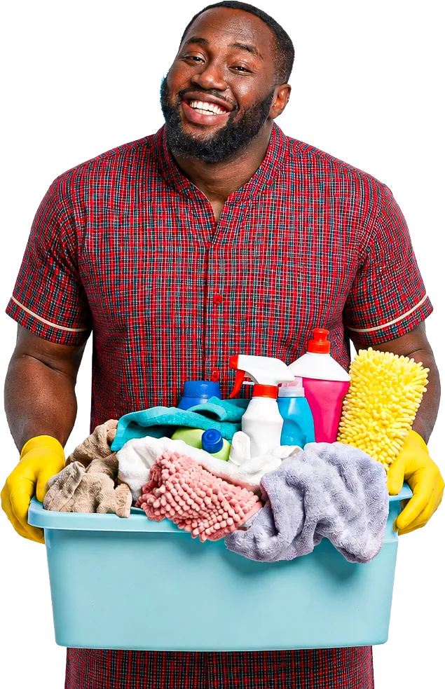A smiling A&M cleaner in yellow gloves holding a basin of cleaning supplies