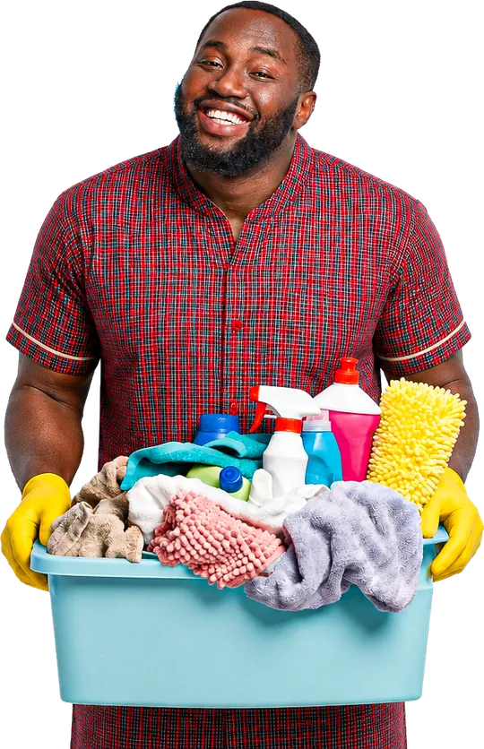 A smiling A&M cleaner in yellow gloves holding a basin of cleaning supplies
